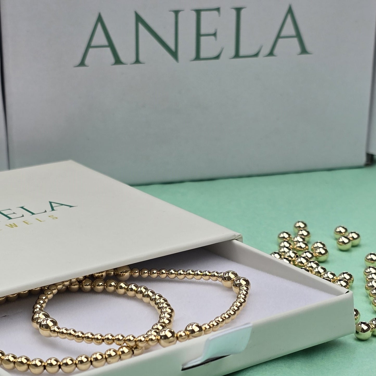 Yellow Gold Beaded Bracelets with Solid Gold and Diamond Pendant